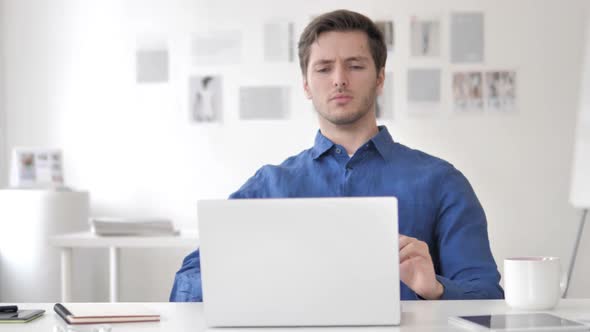 Tired Casual Adult Man Relaxing Body By Stretching alt