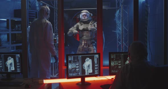 American Astronaut Testing Spacesuit Mobility alt