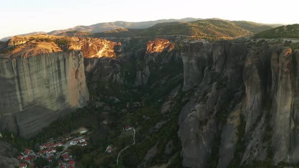 Mountain Monastery n Meteora at Sunset Aerial View