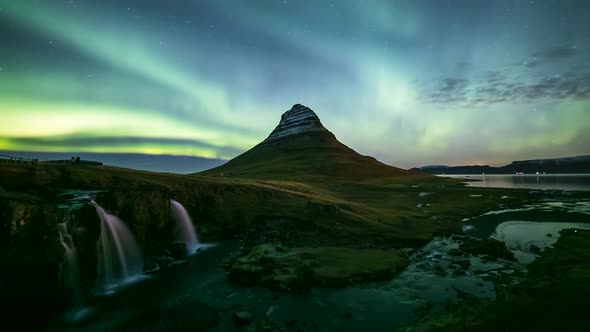 4K Time lapse of Aurora Borealis (Northern lights) over Kirkjufell mountain, Iceland  alt