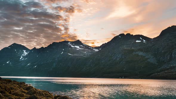 Breath taking timelapse from Ersfjorden in Northern Norway, Tromso. Amazing clouds passing by alt