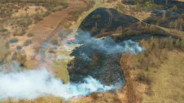 Aerial View Spring Dry Grass Burns During Drought Hot Weather alt