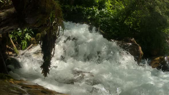 Beautiful Mountain Waterfall From a Forest River. Beautiful Nature in the Forest alt