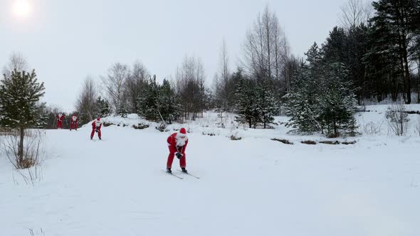 Santa Claus Skiing Down the Hill in Snowy Forest