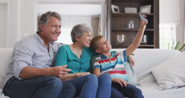 Grandparents and grandson spending time together alt