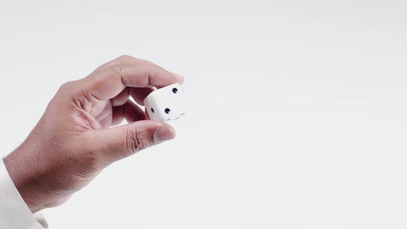 Hand Holds White Dice One To Six alt