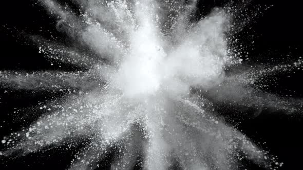 Super Slowmotion Shot of White Powder Explosion Isolated on Black Background alt