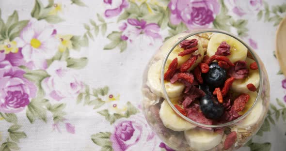 Glass of breakfast with spoon 4k alt