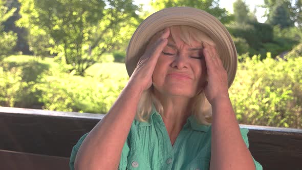 Senior Lady Has Headache alt