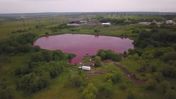 Artificial Lake in Industrial Zone, Unusual Pink Water, Aerial View