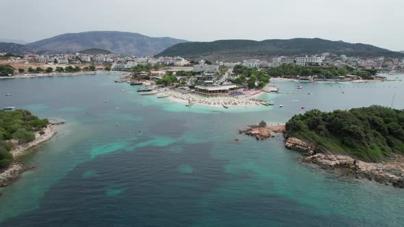 Aerial View of Tropical Beach in Ksamil Islands with Turquoise Water Albania alt