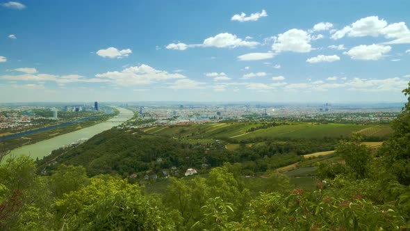 Time-lapse of the city of Vienna, Austria on a sunny day with moving clouds - shot in July 2022 alt