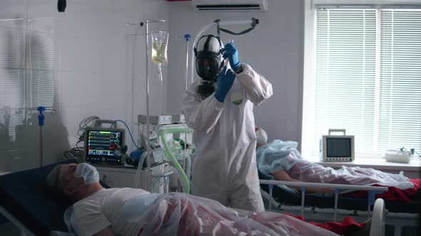 Medical Worker Is Giving an Injection To a Patient Lying in Bed alt