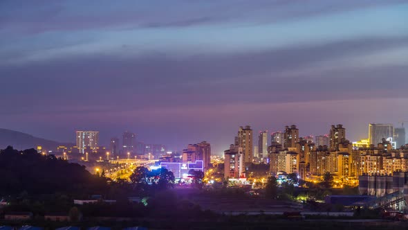 Time lapse of cityscape at night alt