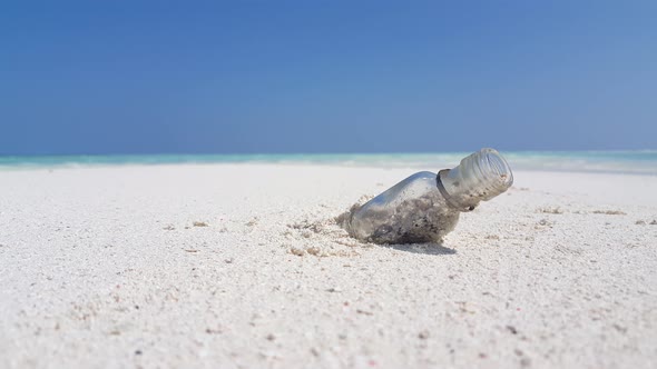 Wide fly over abstract shot of a white paradise beach and turquoise sea background in 4K alt