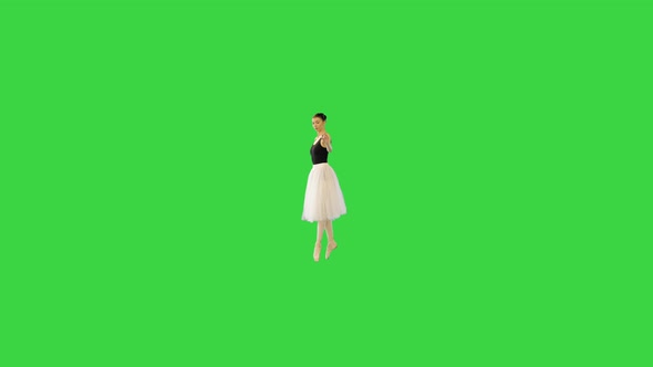 Young Ballerina Walks En Pointe and Runs on a Green Screen Chroma Key