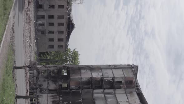 Vertical Video of the Consequences of the War in Ukraine  a Destroyed Building alt