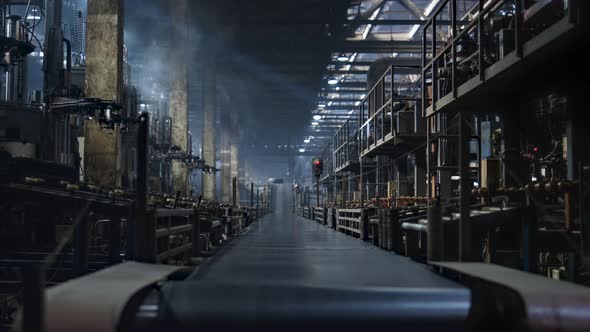 Tire Workshop Conveyor Belt Moving New Rubber Production in Industrial Factory alt