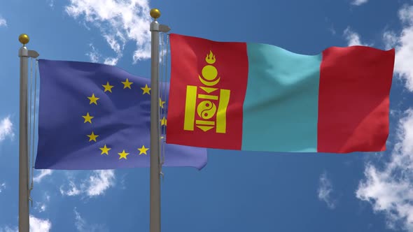 European Union Flag Vs Mongolia Flag On Flagpole alt