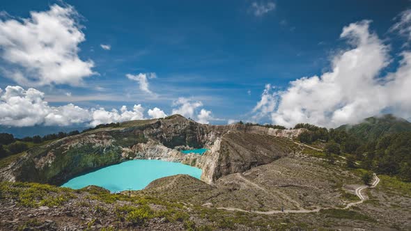Turquoise Kelimutu Crater Lake Surrounded By Rocky Hills