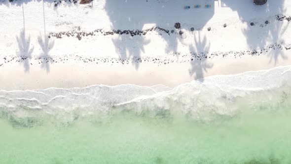 Vertical Video of the Ocean Near the Coast of Zanzibar Tanzania Aerial View alt