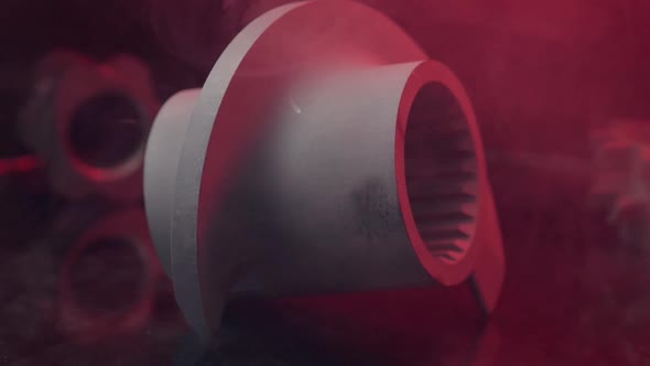 Machine Parts Shot in the Dark with Red Backlighting alt