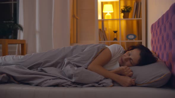 Senior Woman Cannot Sleep Because of Neighbor Playing Ukulele and Singing alt