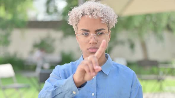 Portrait of No Sign By Young African Woman By Finger Shake alt