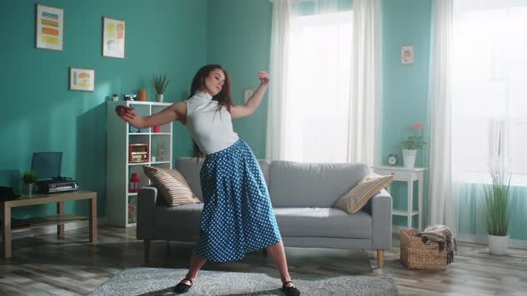 Ballet Dancer Is Practicing at Home Alone alt