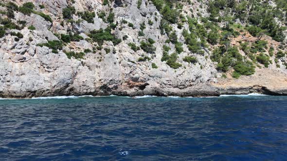 Boat trip along the coast of Palma De Mallorca on a sunny summer day alt