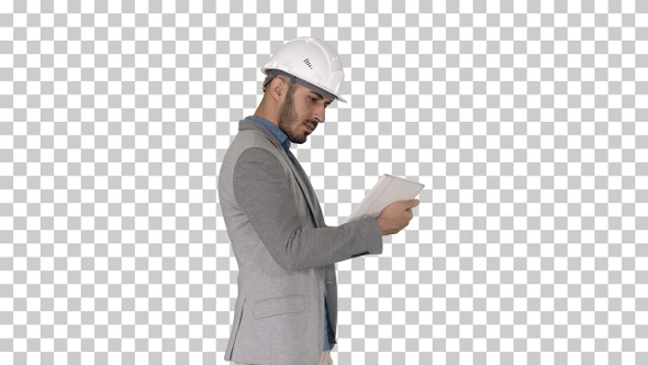 Engineer walking and working on digital tablet, Alpha Channel alt