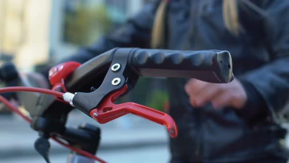 Close-Up of Schoolgirl in Helmet Riding Bicycle, Rules and Safety, Leisure Time