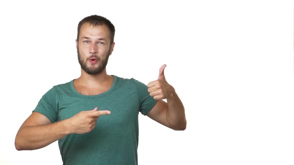 Slow Motion Copy Space Portrait of Adult Satisfied Brunette Guy 30s Pointing Index Finger on alt