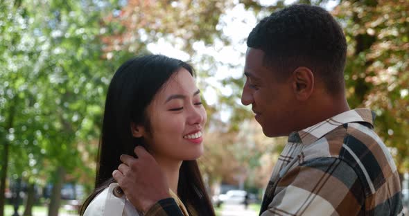 Affectionate Guy and His Girlfriend Enjoy a Romantic Intimate Moment Stroking and Straightening Her alt