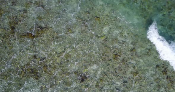 Daytime above abstract shot of a white paradise beach and aqua turquoise water background in colourf alt