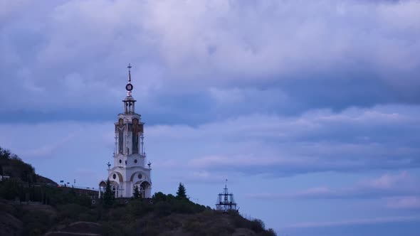 A time lapse of a church during twilight