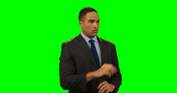 Businessman touching invisible screen alt