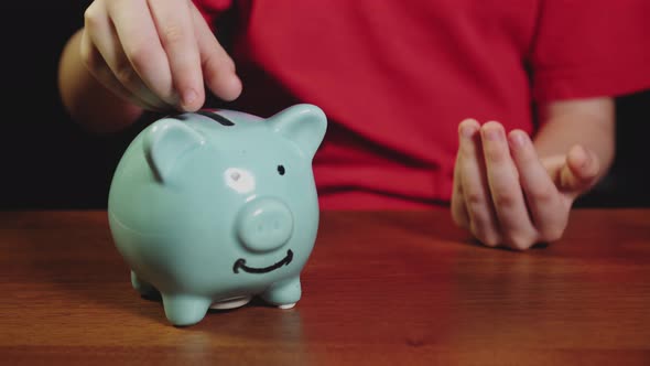 Boy Saving Money Concept alt