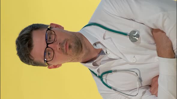 Portrait of Young Doctor in Lab Coat Denying Something To the Camera alt
