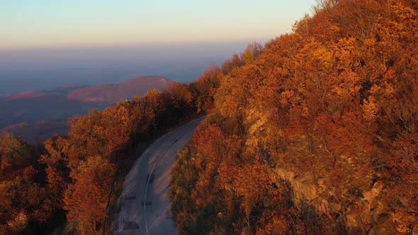 Flight Over A Mountain Road In The Autumn Season alt