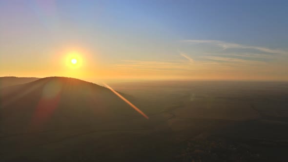 Great View of Foggy Sunset in a Mountain Forest on Beautiful Autumn Landscape alt