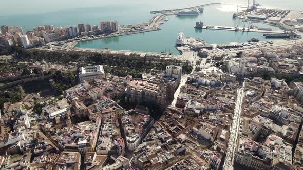 Malaga city port, cityscape and seascape, Spain. Aerial wide shot