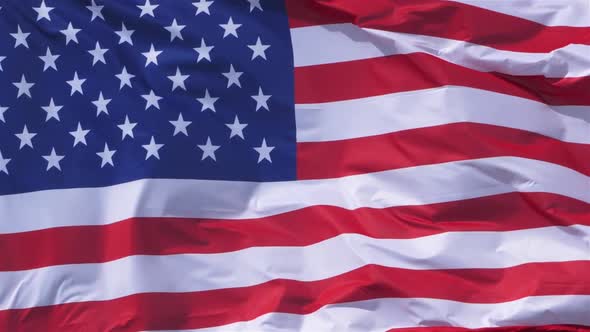 The national USA flag waving in the wind. alt