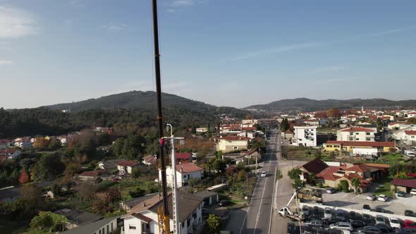 The Electrician On a Column alt