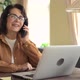 Senior Woman Employee Talk on Phone When Working with Laptop - VideoHive Item for Sale