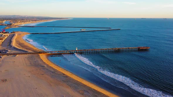 Flying away from the Anaheim Bay Jettys and the Seal Beach Pier. alt