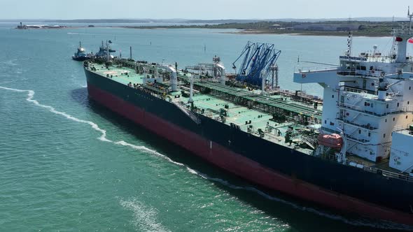 Fuel Tanker Vessel Offloading at a Depot Jetty alt