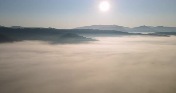 The Sun Rose Over The Mountains, Where Everything Was Covered With Fog. Dawn In The Carpathians