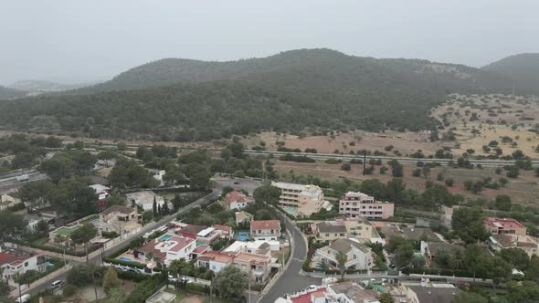 Hotel Buildings With Swimming Pools In The City In Mallorca Spain With Mountain Landscape In alt