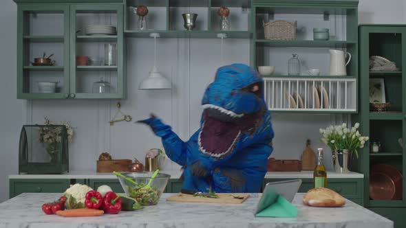 Big Blue Dinosaur Dancing Positive in Kitchen alt